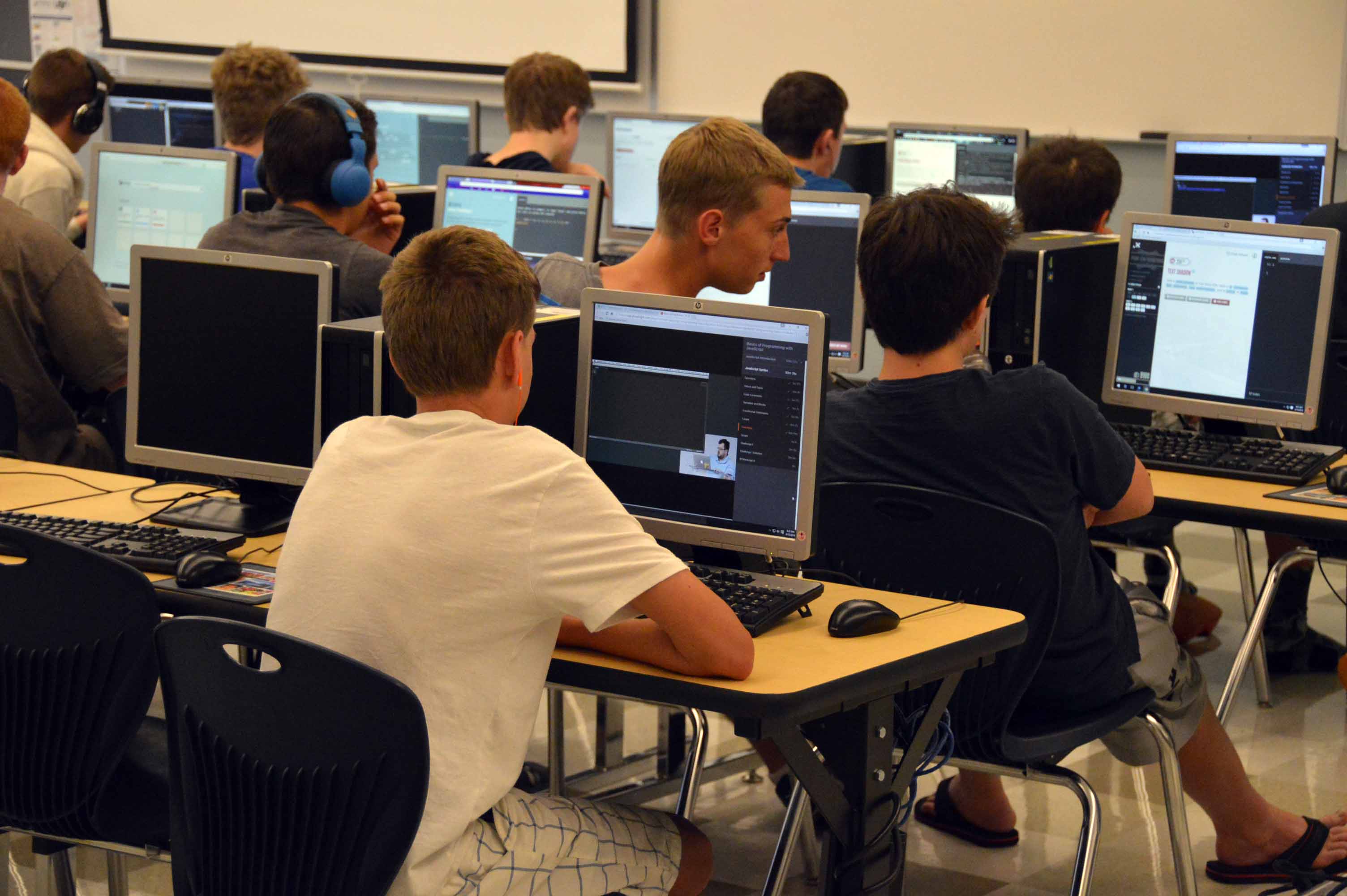 Handful of students trade summer play for computer code ...