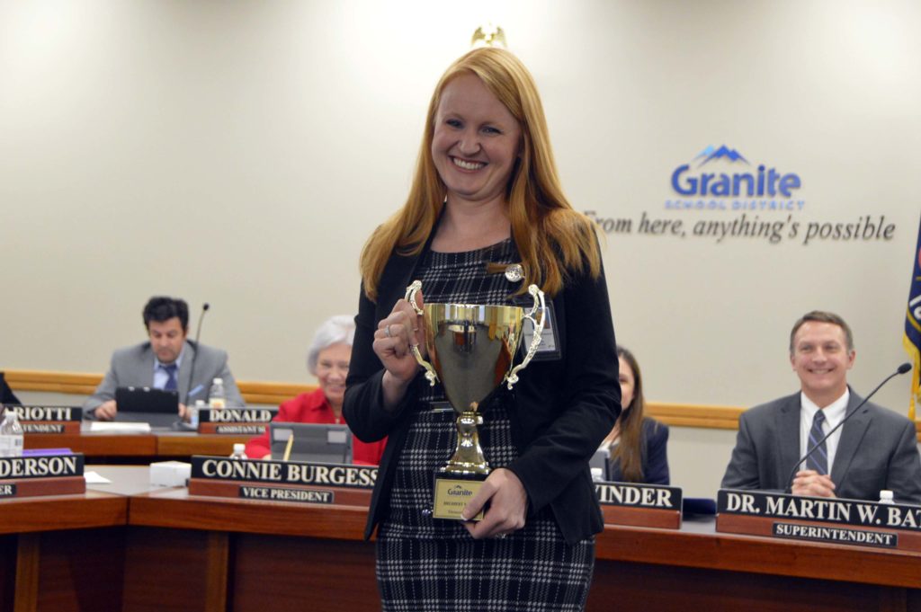 Oakridge Elementary principal holding MGP cup