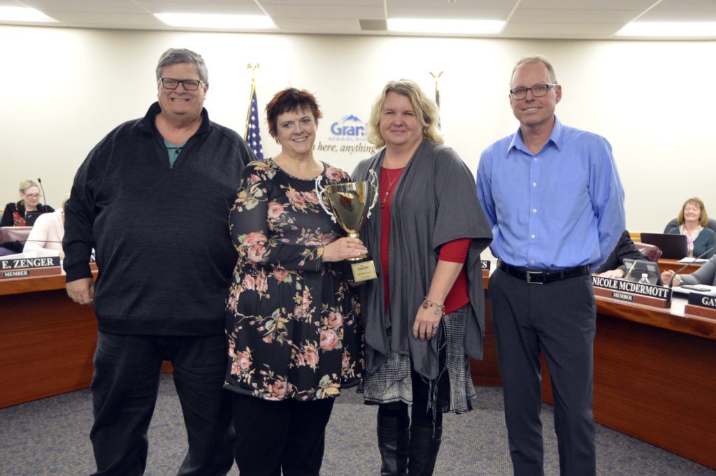 Eastwood Elementary teachers holding MGP cup