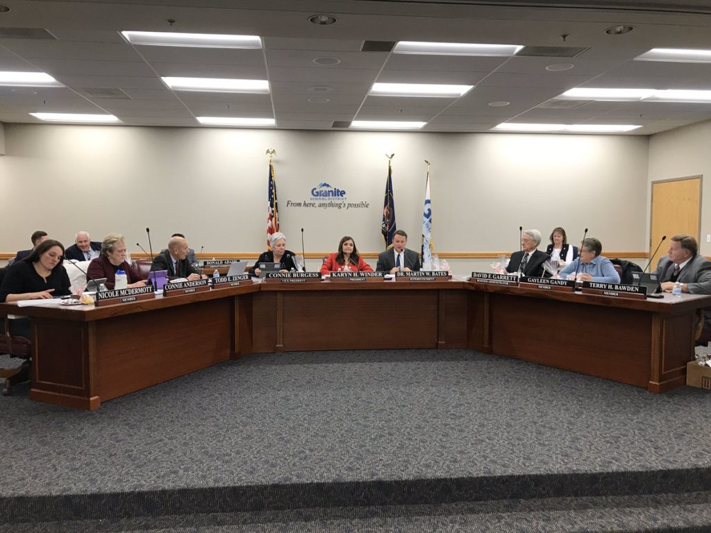 Board members in discussion in board room